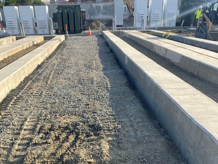 Concrete trenches and equipment pads at a Patriot General substation site
